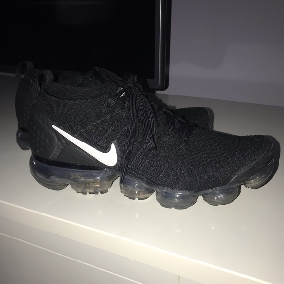 all black vapormax with white check